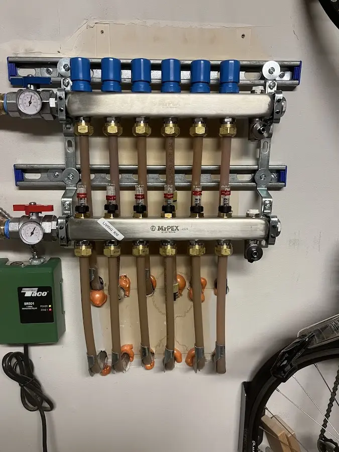 Plumber performing Leak Detection at a residential property in Manor